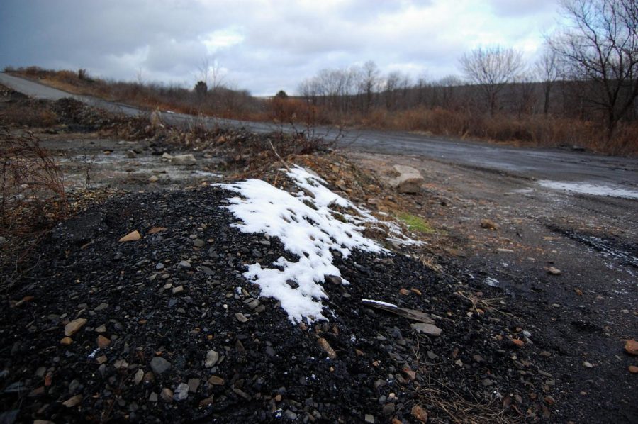 A+thin+layer+of+snow+covers+piles+of+rocks+in+the+desolate+Centralia+landscape.+Photo+by+Meliha+Anthony.