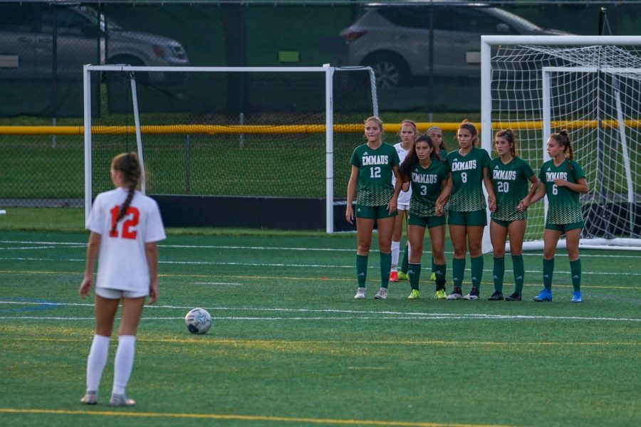 Emmaus players form a defensive wall to protect their goal at the game against Northampton. Emmaus beat Northampton with a score of 3-0 at the game on Sept. 8. Photo by Alice Adams.