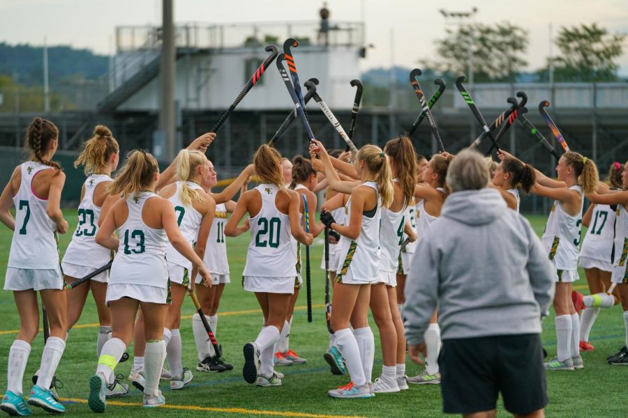 The+EHS+field+hockey+team+starters+enter+the+field+under+an+arch+created+by+their+teammates.+THe+heat+beat+Hazelton+Area+High+School+on+Sept.+9+10-0.+Photo+by+Alice+Adams.