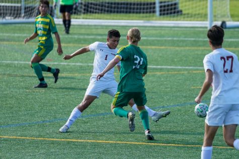 Senior Holden Brown fights for the ball against a Whitehall Zephyr at a soccer game on Sept. 10. Emmaus tied with Whitehall with a score of 2-2. Photo by Alice Adams.