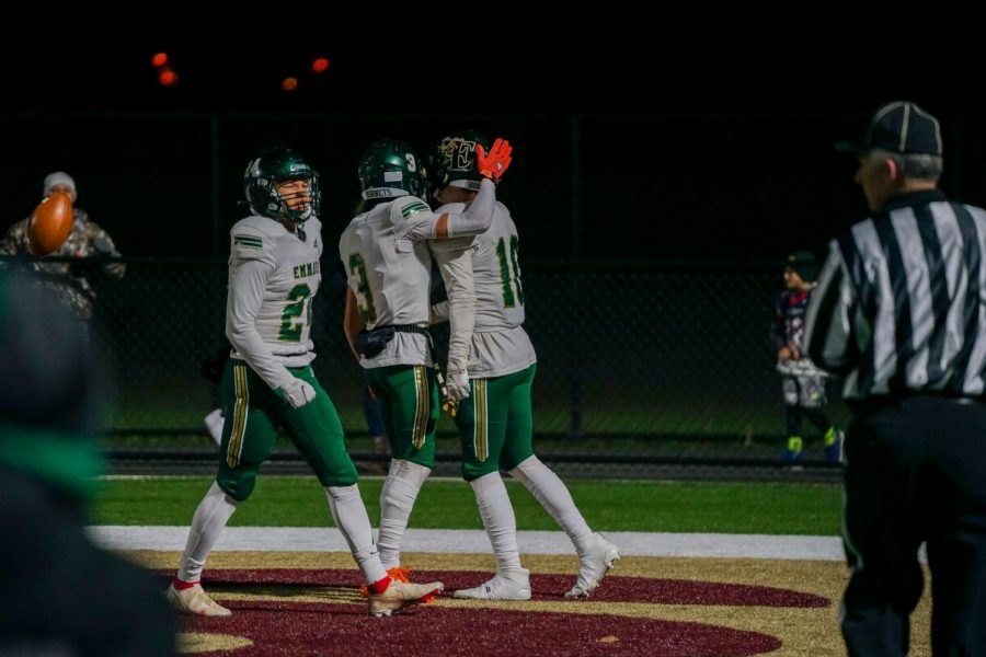Emmaus Hornets celebrate after scoring the first touchdown of the District 11 Class 6A championship game against the Freedom High School Patriots on Nov. 19. The Hornets ultimately fell to the Patriots with a score of 28-14. Photo by Alice Adams.