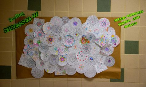 A coloring wall outside of Room 557 has offered stressed out students a moment to relax. Photos by Huy Huynh.