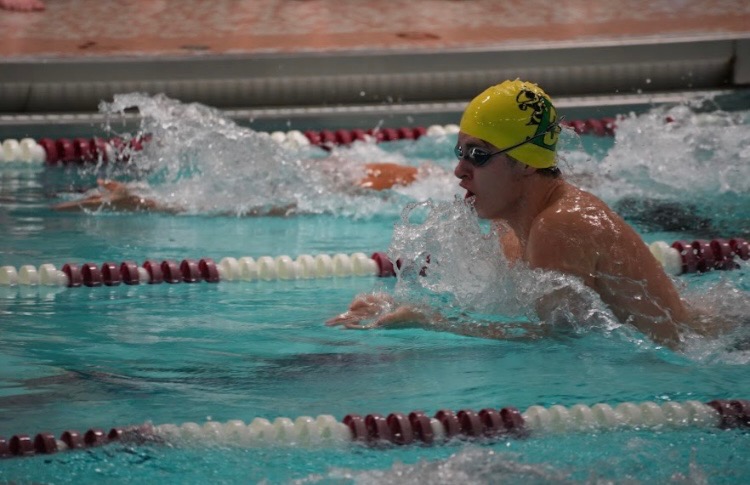 Sophomore Carson Mosel races to the ending doing a breaststroke at the first meet against
East Stroudsburg North on Dec. 2. Photo courtesy of Ron Karboski.