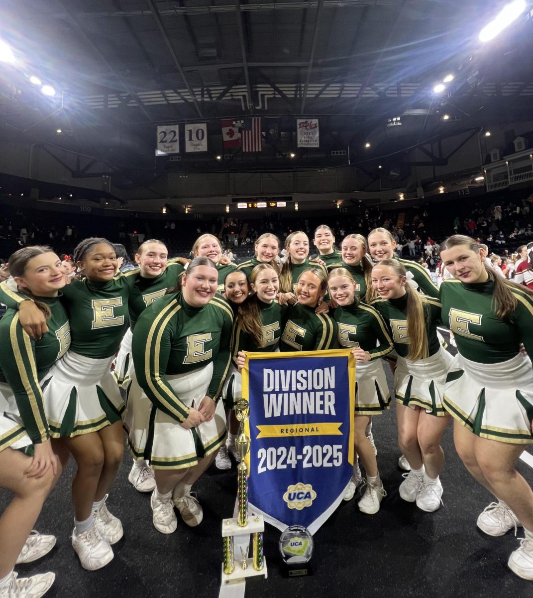 On Dec.15, the Yellowjackets won the regional competition, advancing them to the national competition. The Yellowjackets cheer team smile after their victory. Photo courtesy of Cayleigh Butz.