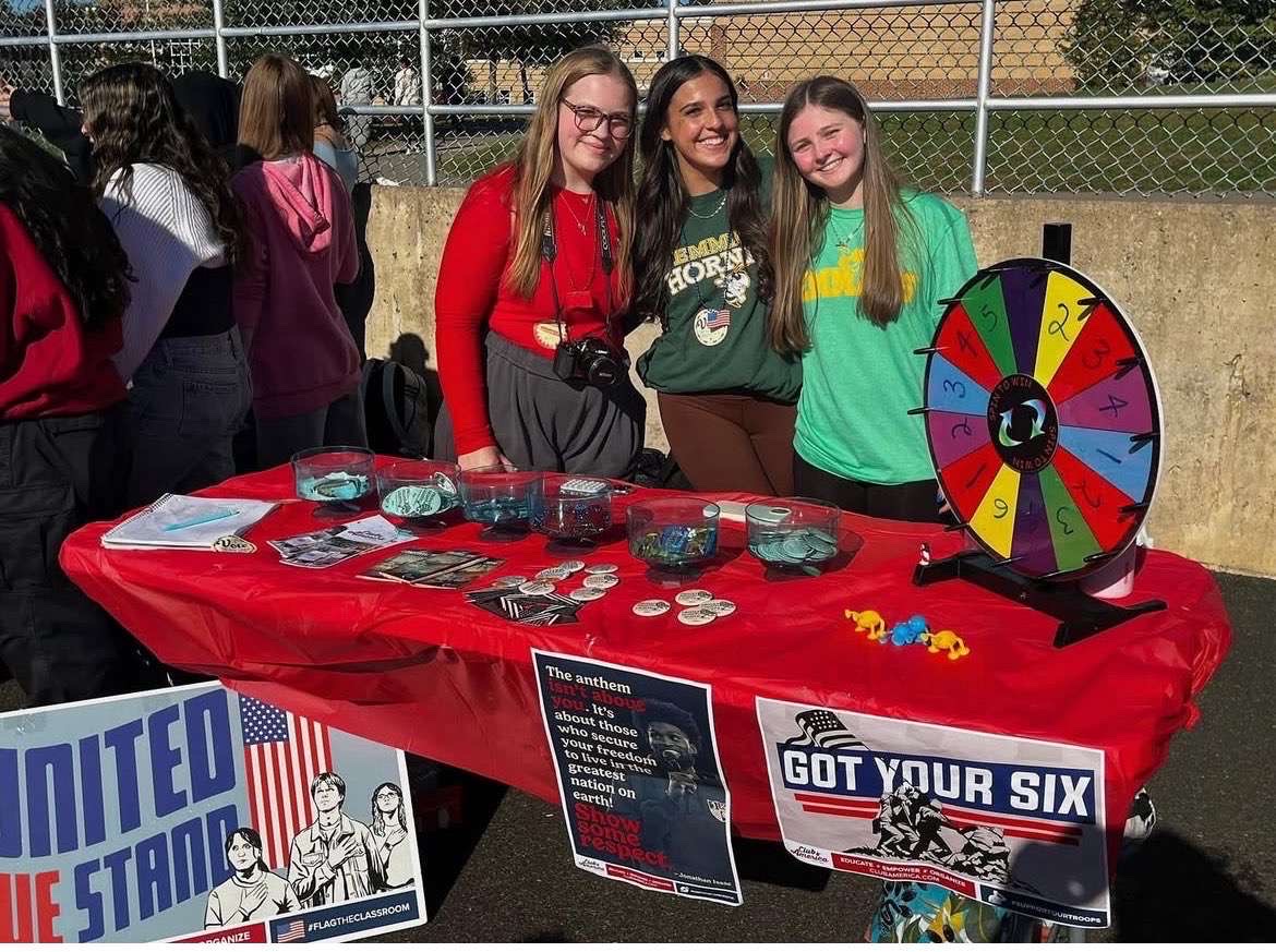 Sophomore Selah Houtz, Gherasim, and freshman Paige McClain pose for a photo during the Tailgate on Oct. 7, 2025. Photo courtesy of Gherasim.