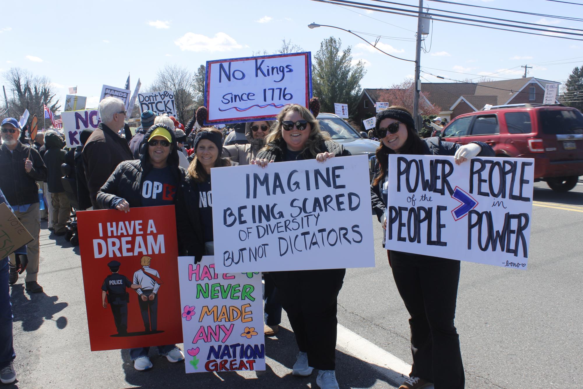 Protesters attending No Kings movement outside of Pennsylvania State Representative Ryan Mackenzie’s office on March 28. Community members held up signs protesting their views on the government. Photos by Danii Rivera and Carter Teti.