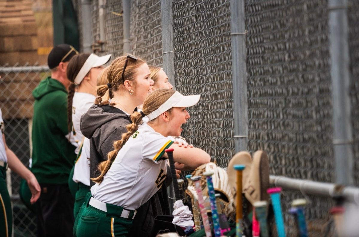 The Emmaus girls softball team watches the game closely. Photo by Danii Rivera.