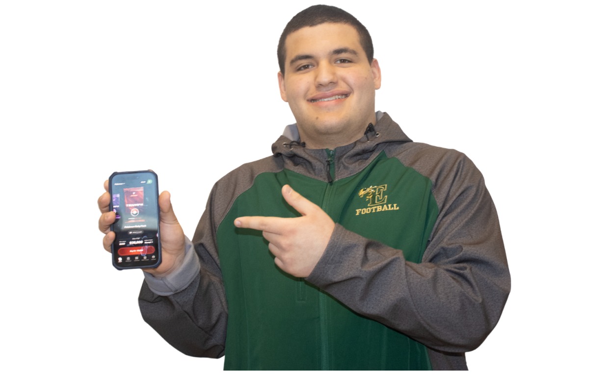 Photo of Anthony Elias showcasing his sports betting app. Photo by Thiffany Ceolin-Reimao.