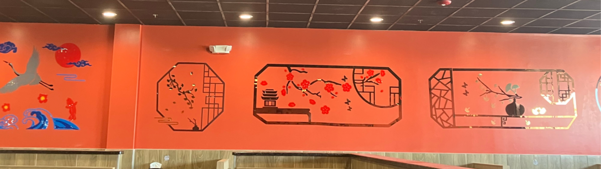 Photo of the wall at Yummy Bowl. Photo by Gabriella Walter.